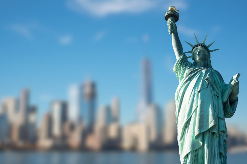 Statue of Liberty against blurred New York background