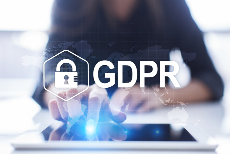 GDPR logo with woman using iPad